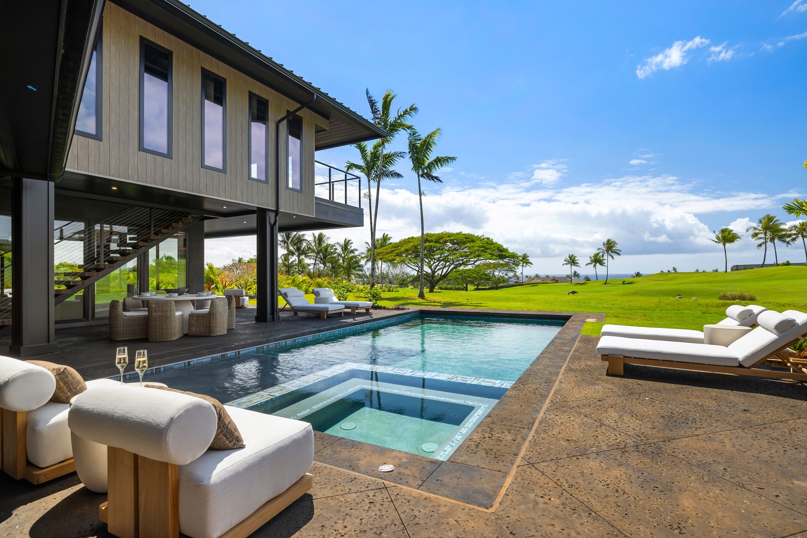 Koloa Vacation Rentals, Hale o ka Nene - Swim beneath the palms or relax poolside, just steps away from your tropical oasis.