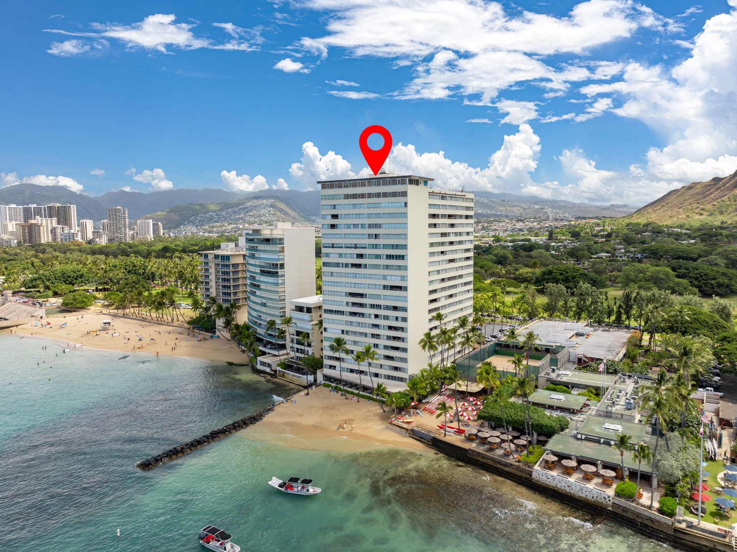 Honolulu Vacation Rentals, Colony Surf Getaway - Aerial view of the beachfront condo with easy ocean access and proximity to city attractions.