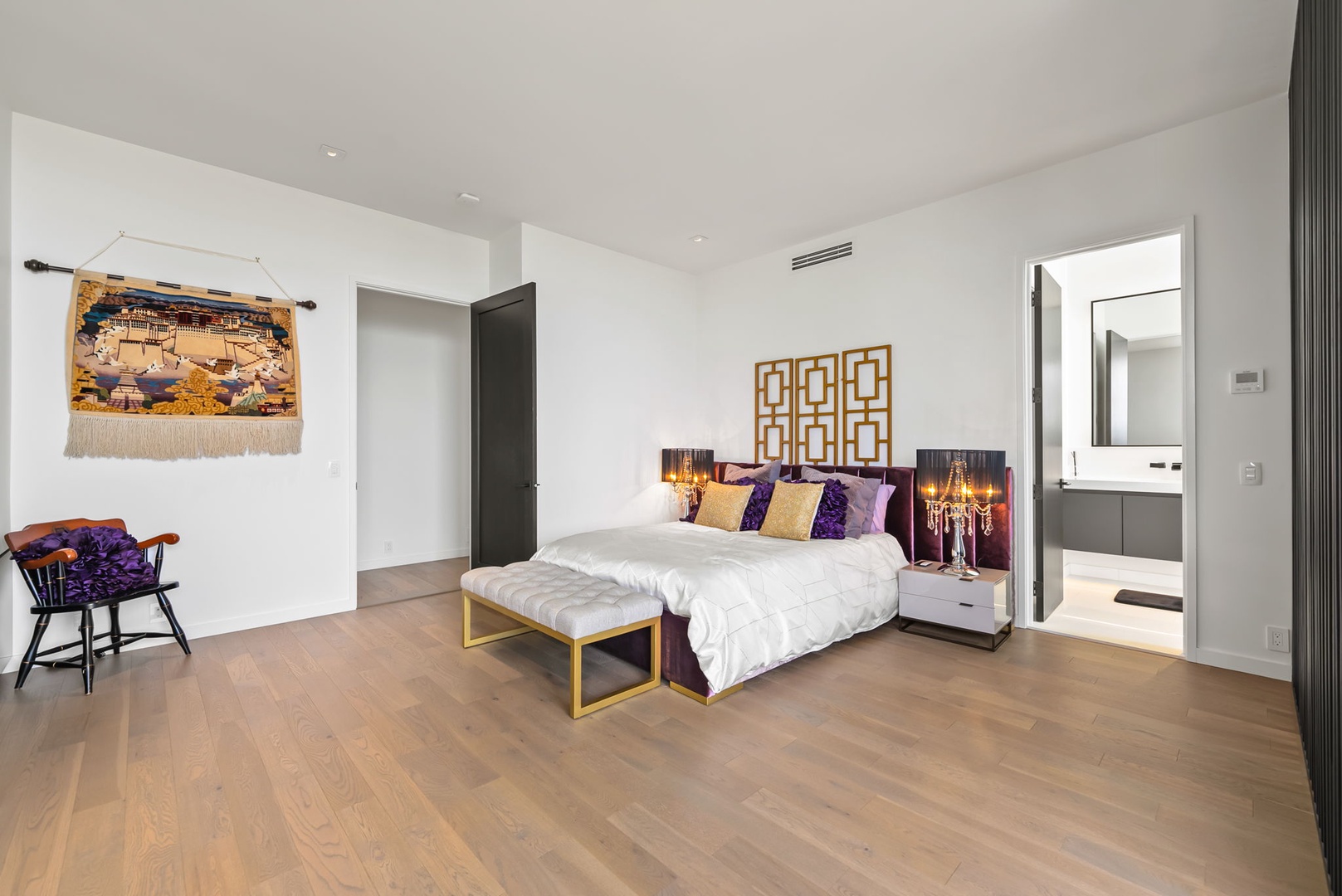 Honolulu Vacation Rentals, Ocean Villa Emilie - Spacious primary suite with clean contemporary design and private lanai access—an elevated space to recharge.