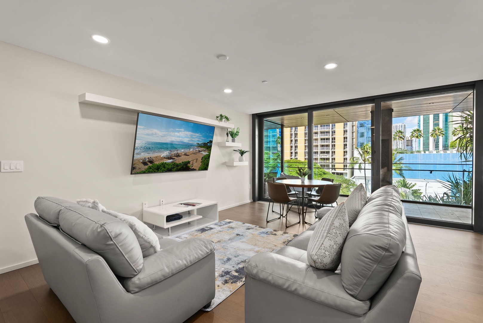 Honolulu Vacation Rentals, Park Lane Getaway - Elegant living space with city views, perfect for cozy gatherings.