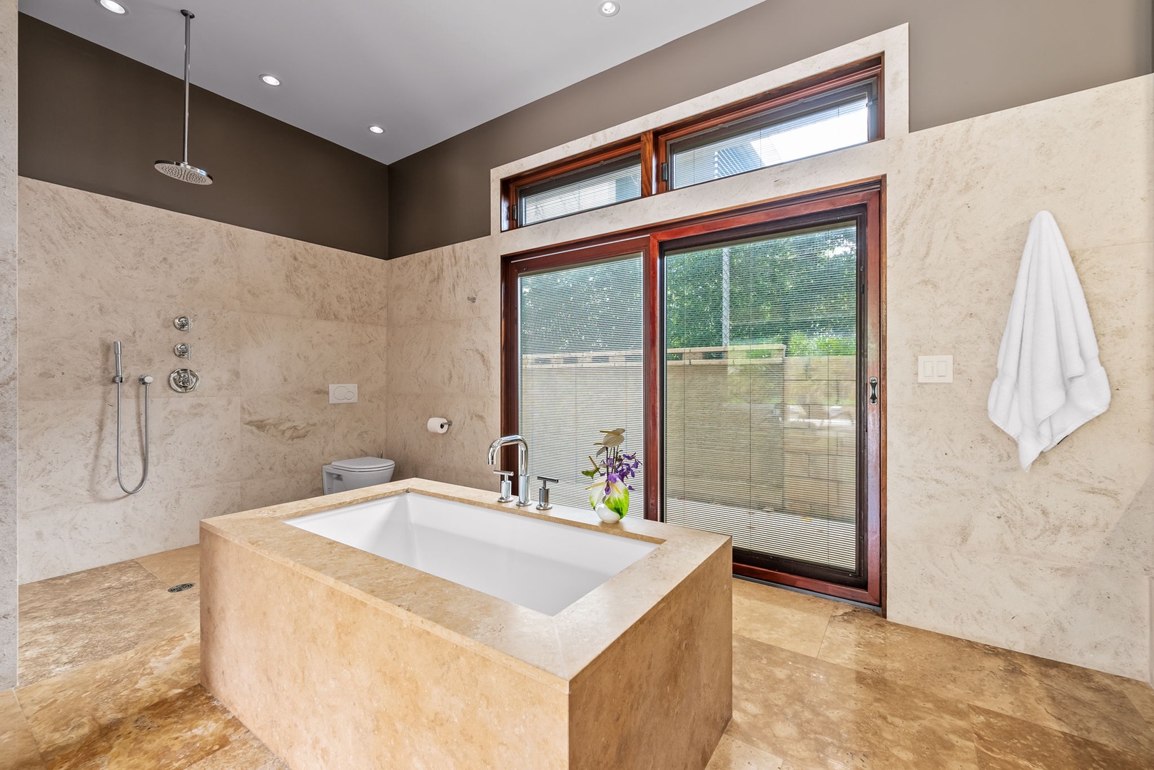 Kailua Vacation Rentals, Makalei - A large soaking tub awaits in the spa-like ensuite bath after a day of exploration.