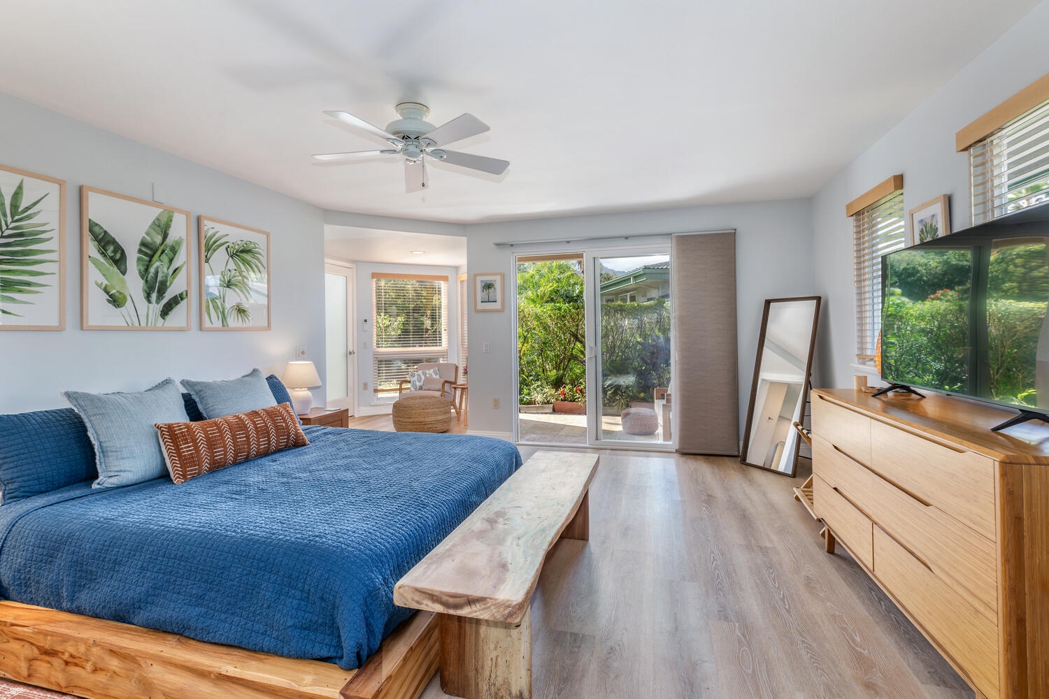 Princeville Vacation Rentals, Sea Glass - The first primary ensuite with a king bed and private lanai.