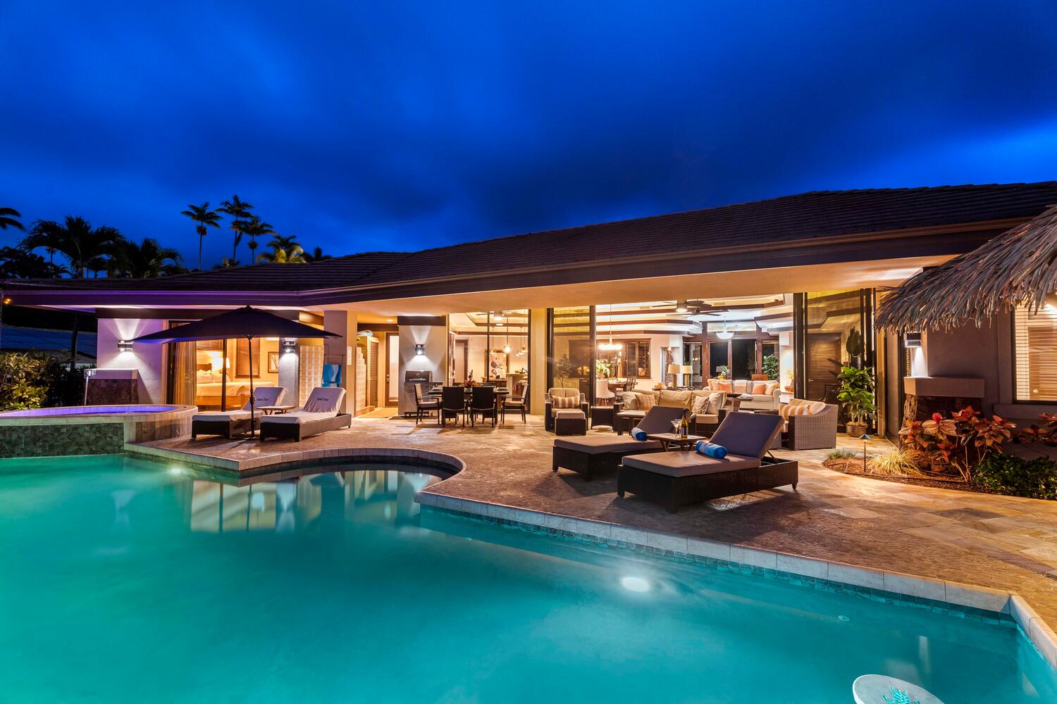 Kailua Kona Vacation Rentals, Island Oasis - The pool glistens under the soft glow of twilight, inviting tranquil reflections.