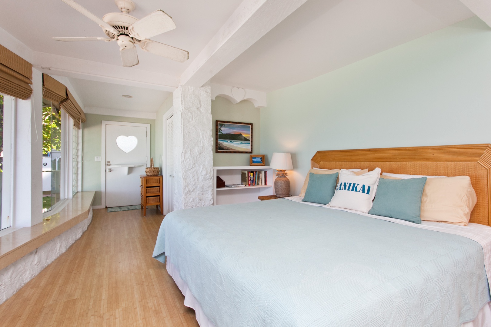 Kailua Vacation Rentals, Lanikai Village* - Hale Kainalu: The primary suite has a king bed, ceiling fan and king bed for a relaxing night.