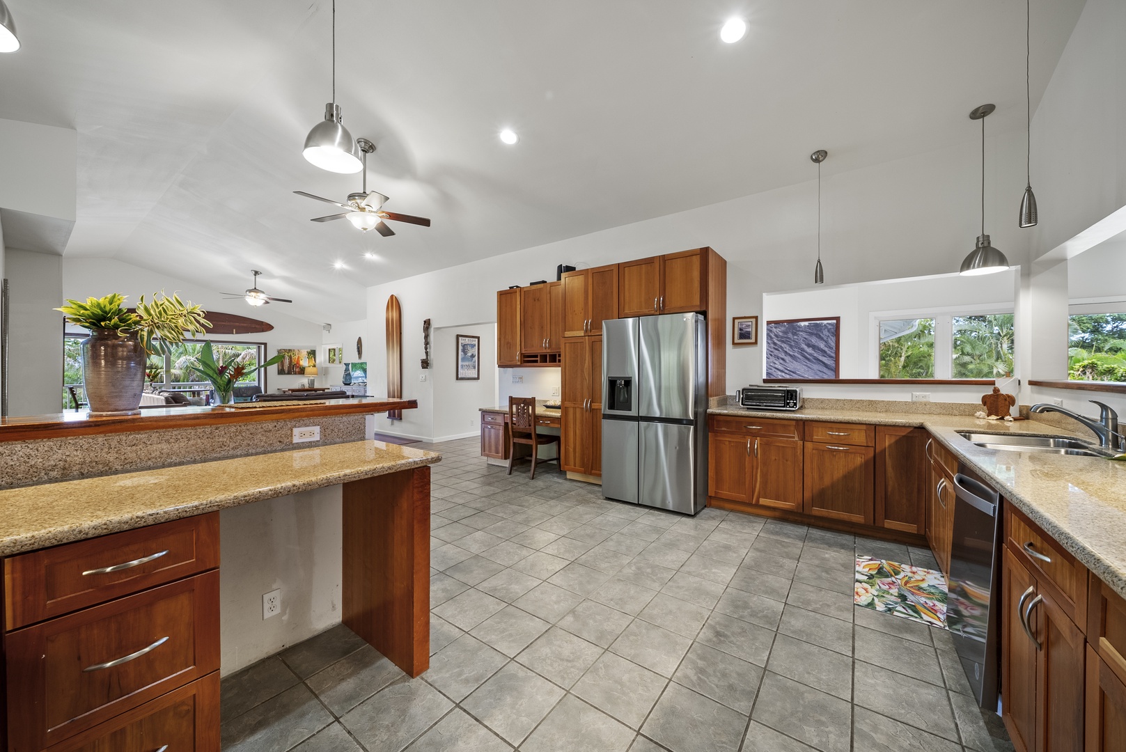 Haleiwa Vacation Rentals, North Shore Tropical Hale - Kitchen-to-living flow with large island and easy access to outdoor spaces.
