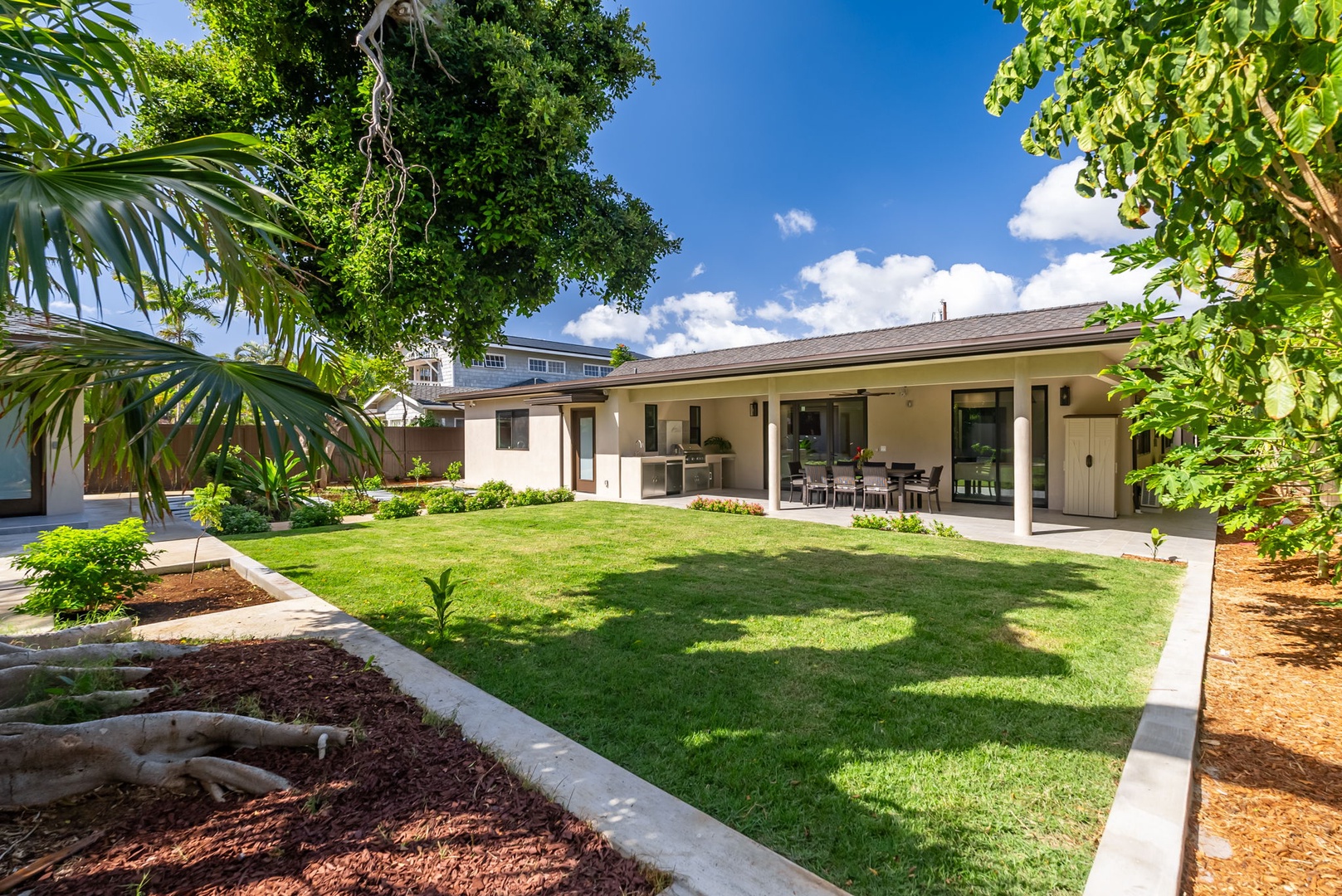 Honolulu Vacation Rentals, Kahala Zen - Beautiful backyard space with mature trees and lush vegetation.