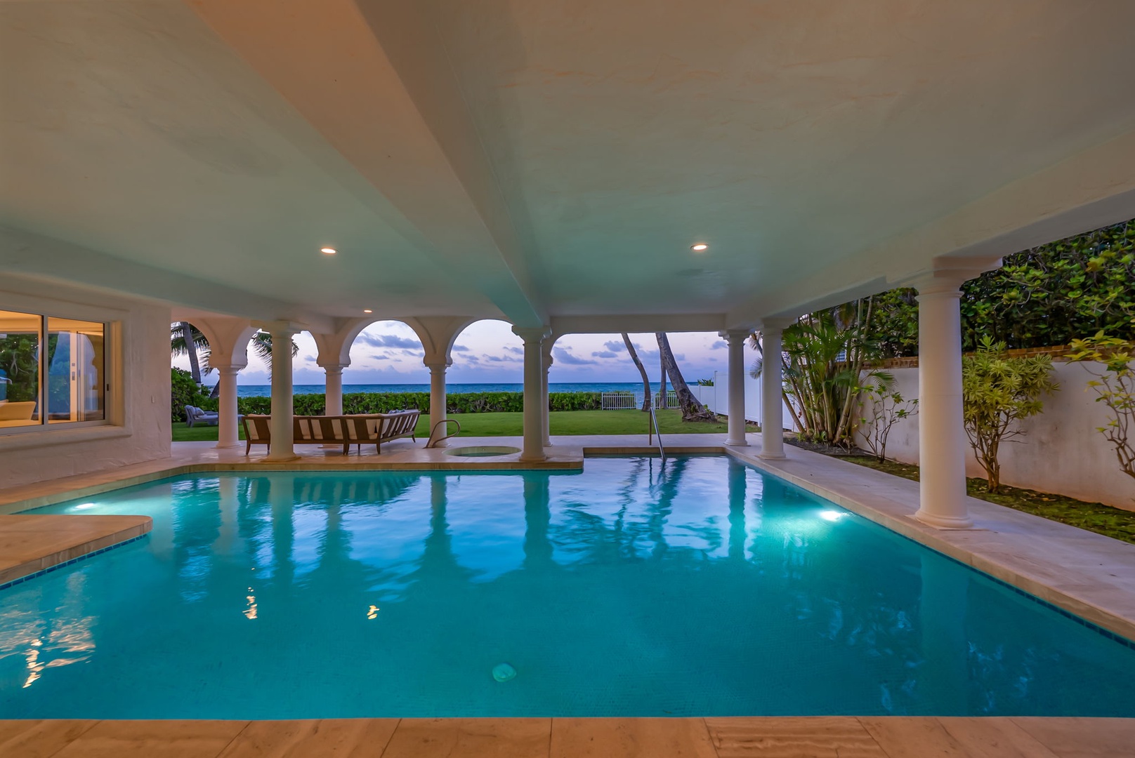 Kailua Vacation Rentals, Lanikai Sunrise Estate - The private heated pool offers a peaceful nighttime retreat with soothing lighting and coastal breezes.