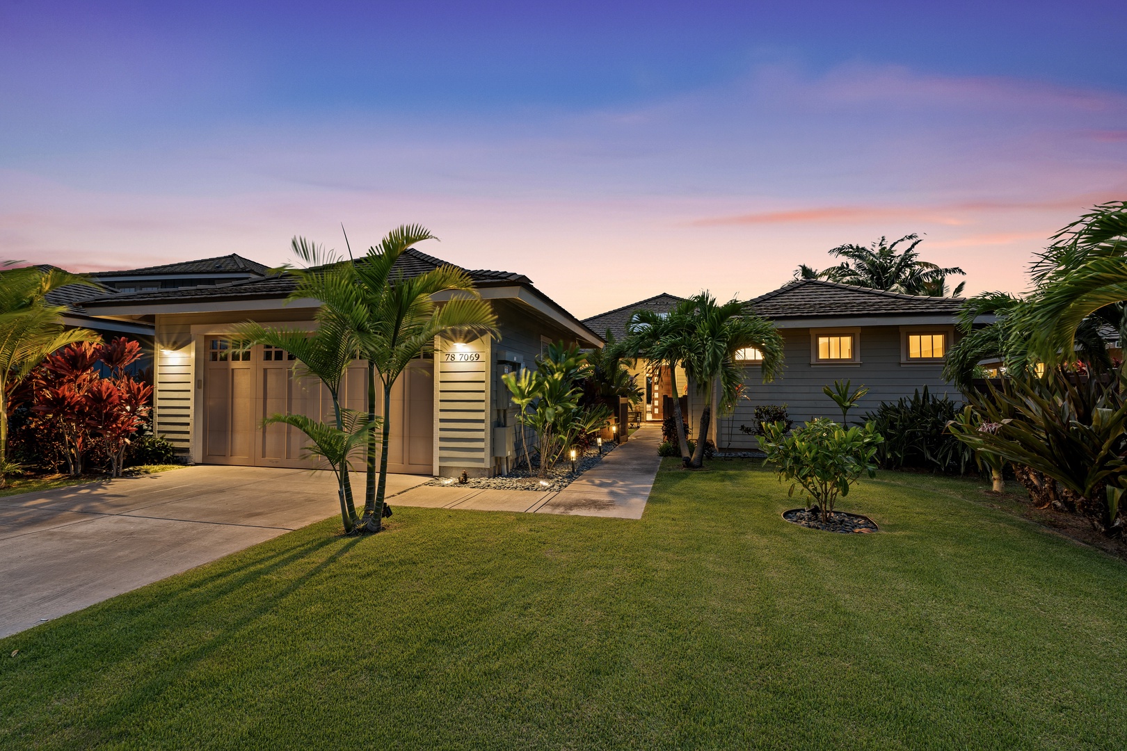 Kailua Kona Vacation Rentals, Holua Kai #27 - Pull into the drive at dusk, the palms lit and the house waiting.