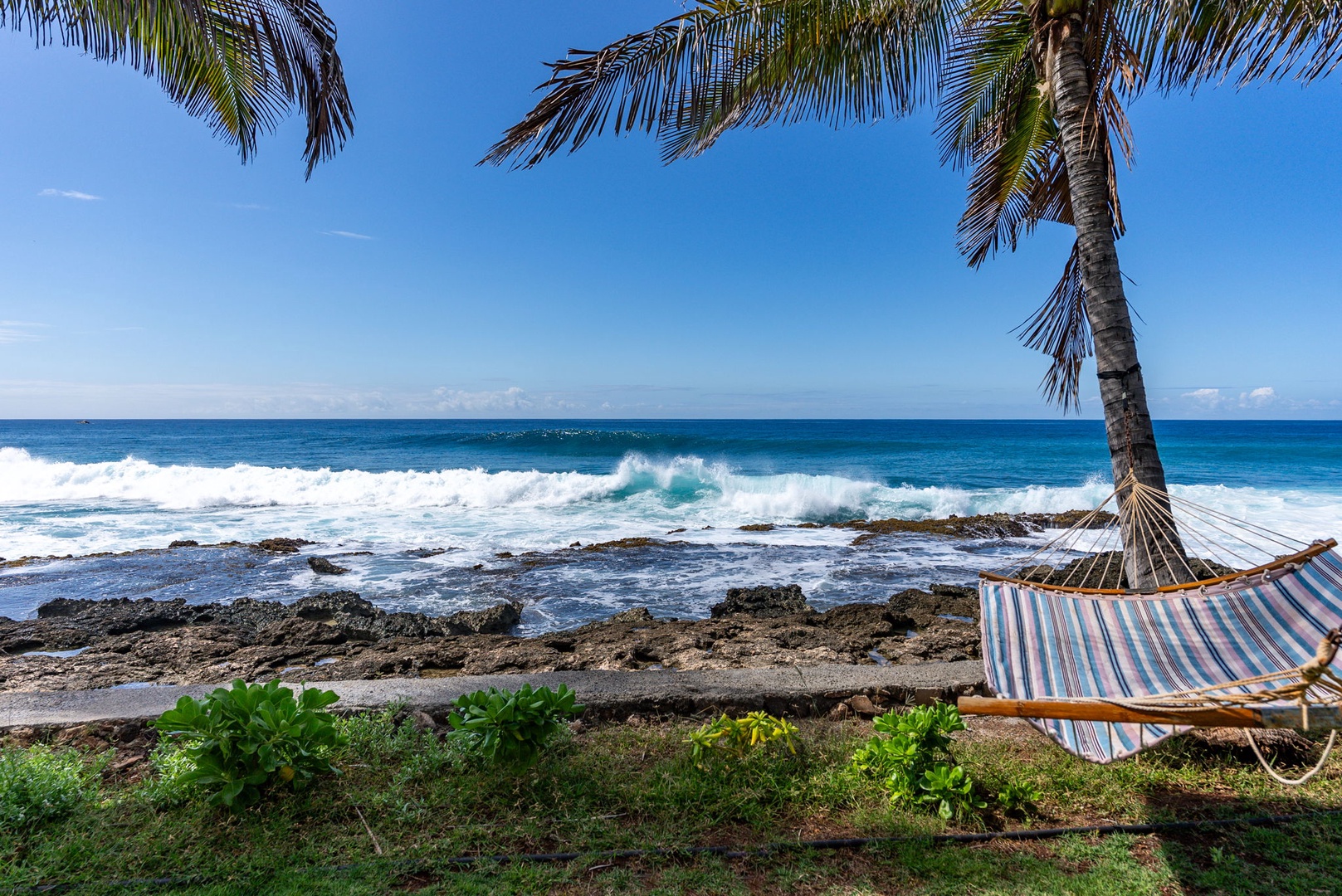 Waianae Vacation Rentals, Oceanfront Luxury Dream Estate - Waves break dramatically against the rocky coast—an exhilarating view from the hammock lawn.