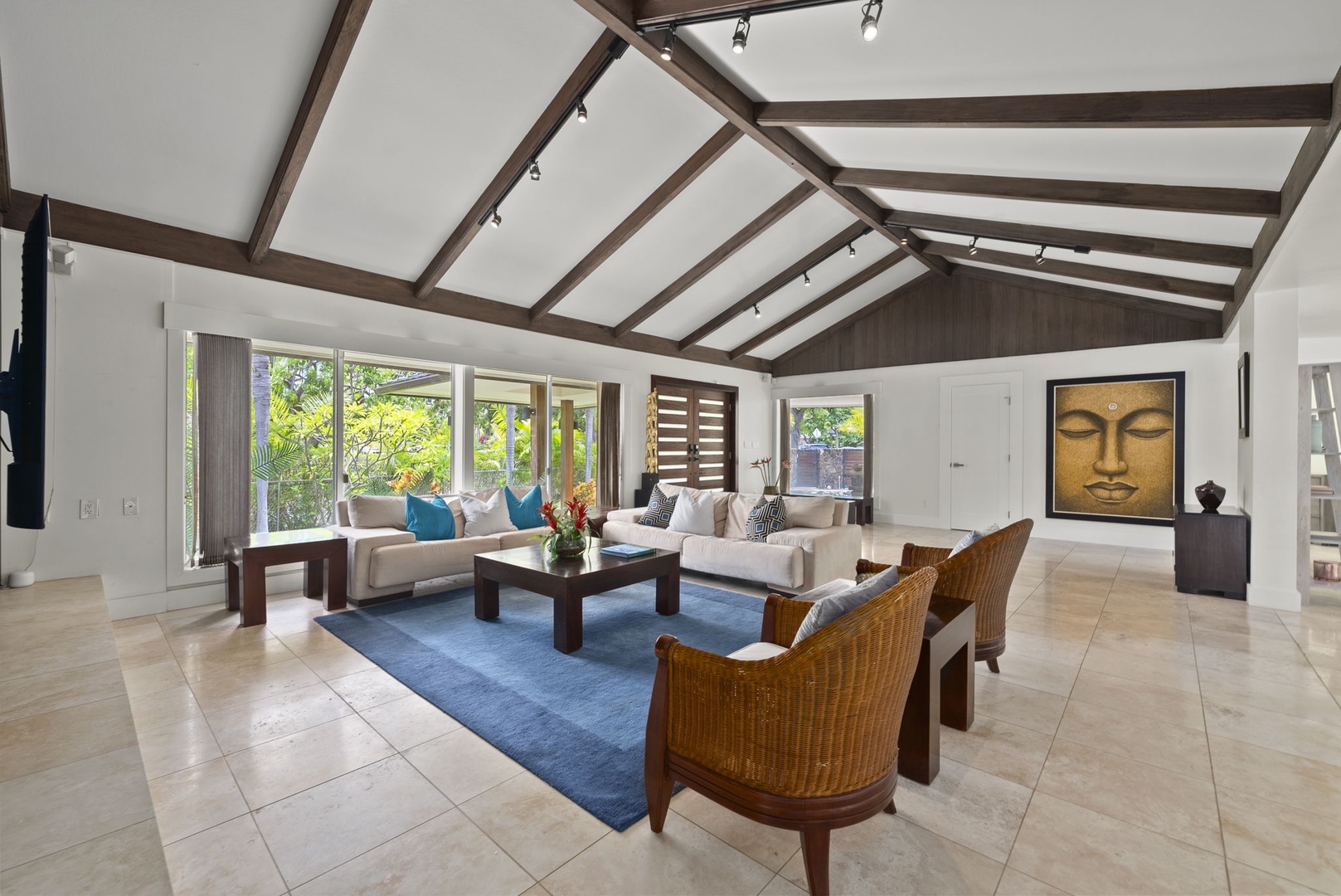 Honolulu Vacation Rentals, Kahala Lani - Sunlit seating nook with pool views, offering a serene space to relax and connect.