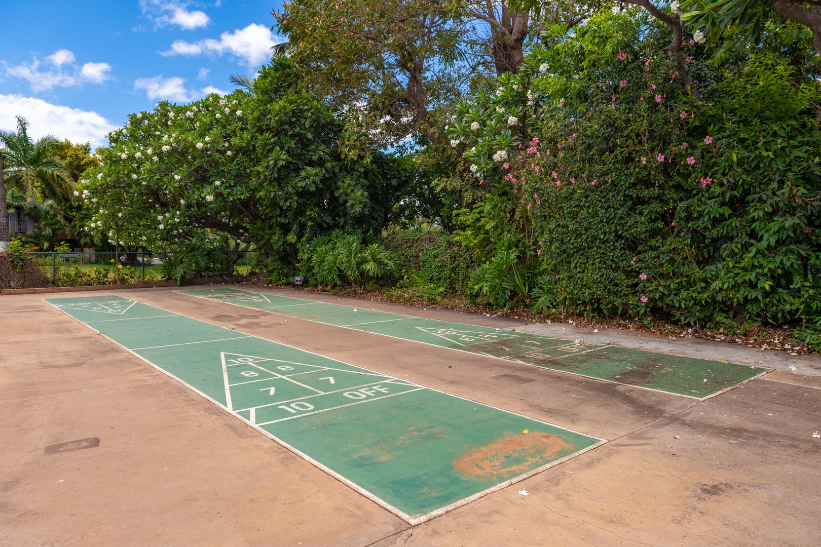 Kihei Vacation Rentals, Koa Resort 1B - Challenge friends and family to a laid-back game on the shuffleboard court.