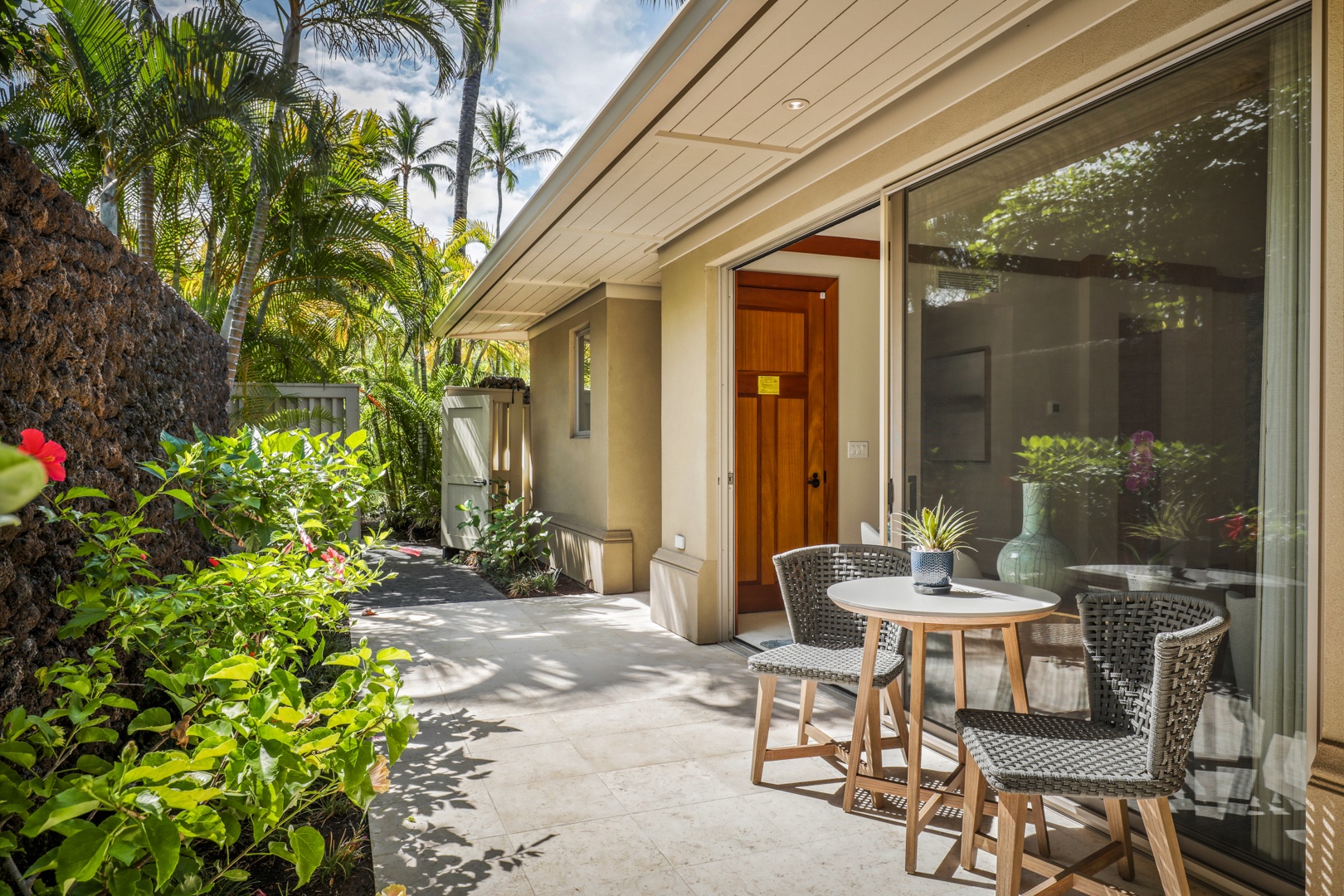 Kailua Kona Vacation Rentals, 4BD Hainoa Estate (122) at Four Seasons Resort at Hualalai - Outdoor seating area off Guest Room 4’s entrance.