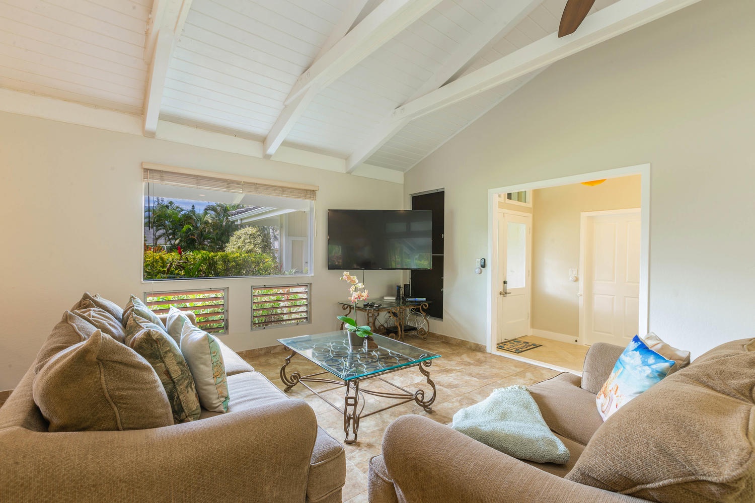 Princeville Vacation Rentals, Mala Hale - Enjoy your favorite movie or TV show on the corner-mounted flatscreen TV.