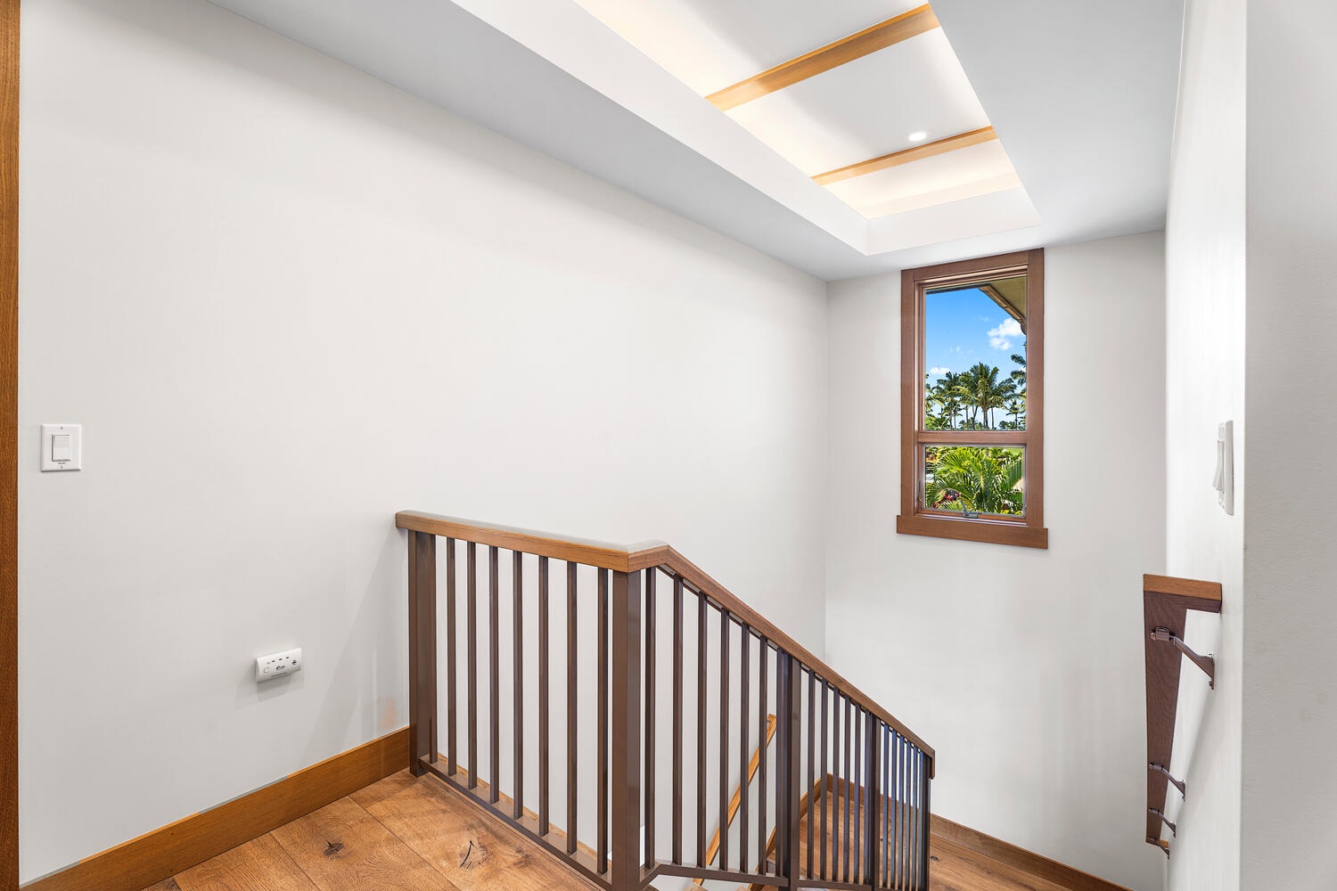 Kamuela Vacation Rentals, Laule'a at the Mauna Lani Resort #14 - Bright stairway with natural light and warm wood finishes connects upper and lower levels.