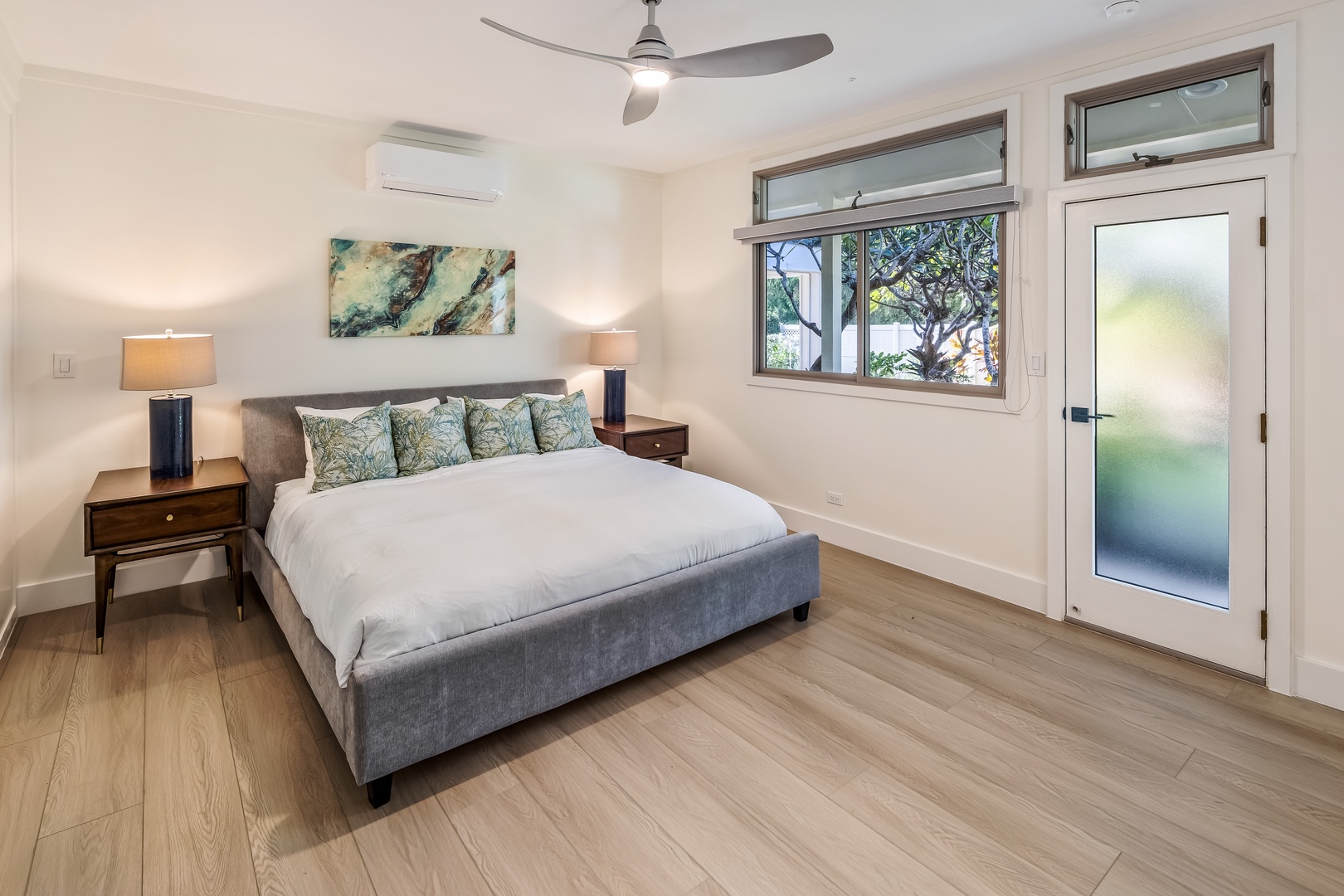 Kailua Vacation Rentals, Na Makana Villa - Guest Bedroom 4 with king bed, garden view, split AC, and ceiling fan