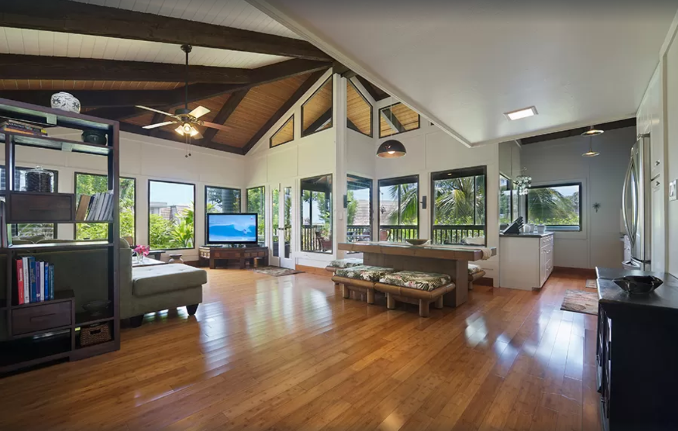 Princeville Vacation Rentals, Mauna Kai 11 - Open floor plan with vaulted ceilings in living room and kitchen