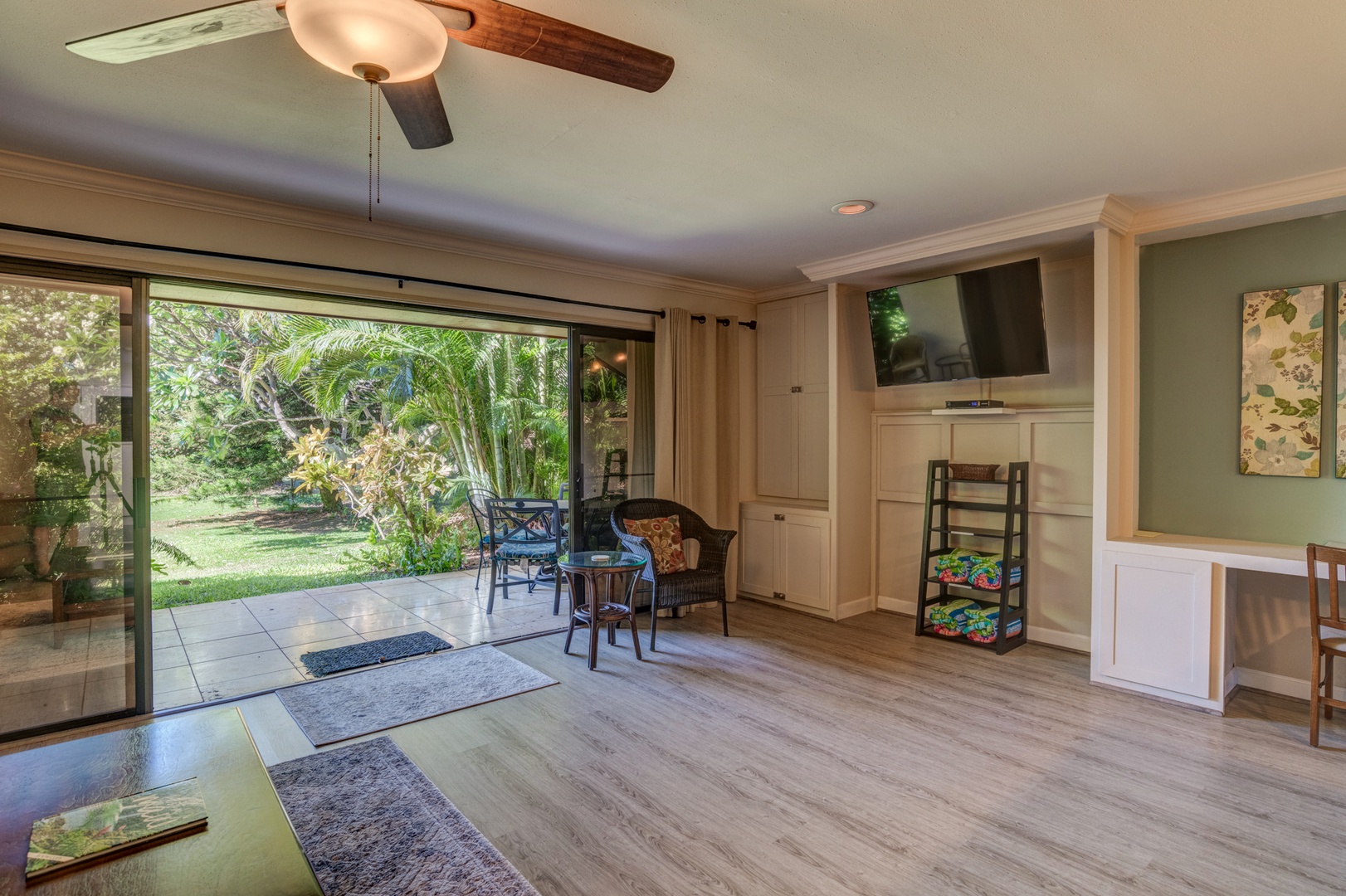 Kihei Vacation Rentals, Koa Resort 1B - Comfortable living space with a ceiling fan, flat-screen TV, and sleeper sofa for extra guest accommodations.