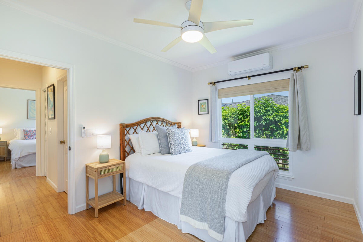 Princeville Vacation Rentals, Hale Cassia - Cozy queen guest room with ceiling fan and A/C.
