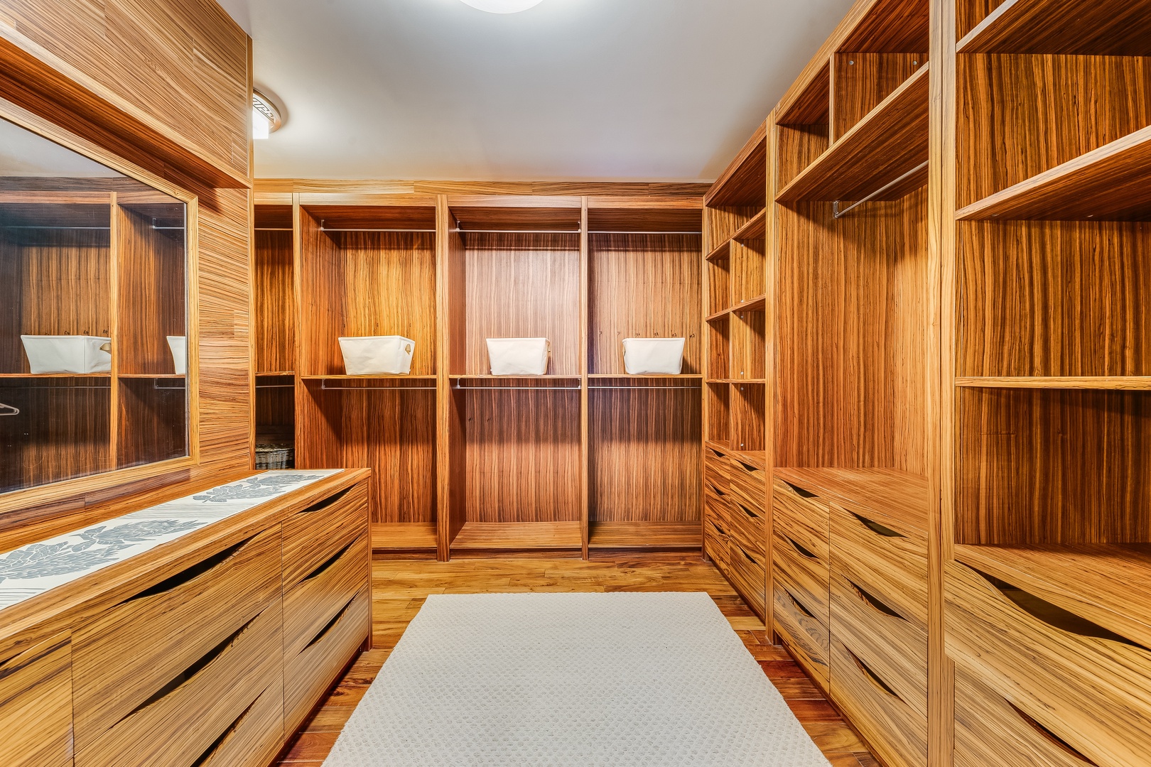 Kailua Vacation Rentals, Castle Point Estate - Custom-built walk-in closet with abundant storage and fine wood detailing.
