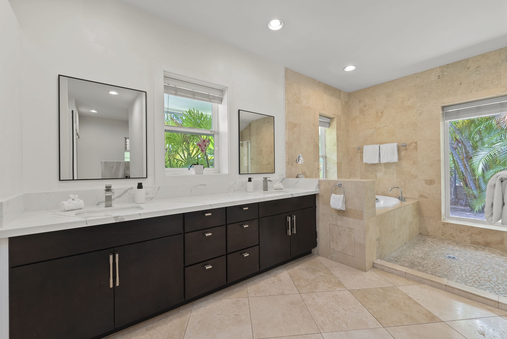 Honolulu Vacation Rentals, Kahala Lani - Primary ensuite with dual vanities and walk-in shower for effortless mornings.