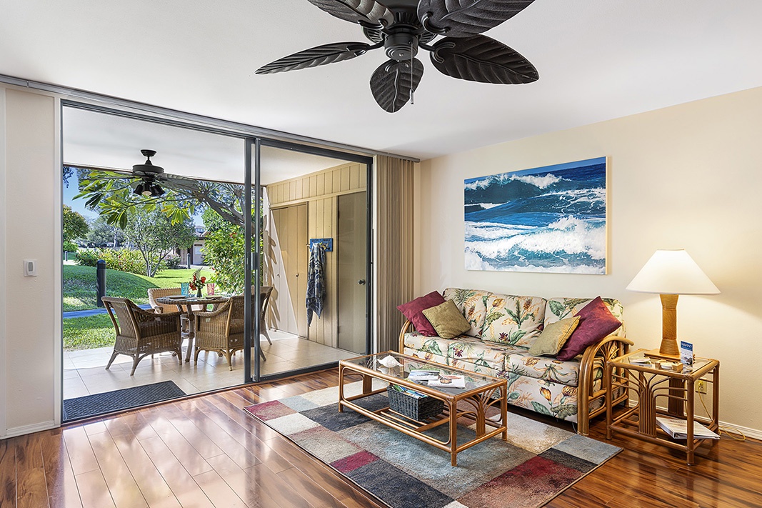Waikoloa Vacation Rentals, Waikoloa Villas F-100 - Spacious living room with queen sleeper sofa—ideal for relaxing or accommodating extra guests in comfort and style.