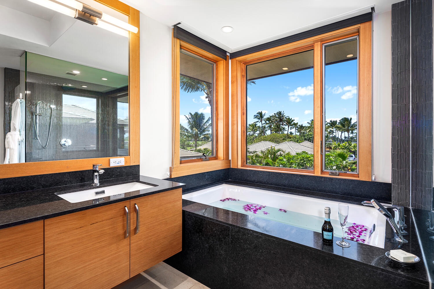 Kamuela Vacation Rentals, Laule'a Ohana Retreat - Dual vanities and a soaking tub with a view elevate the ensuite experience at Laule'a #14.