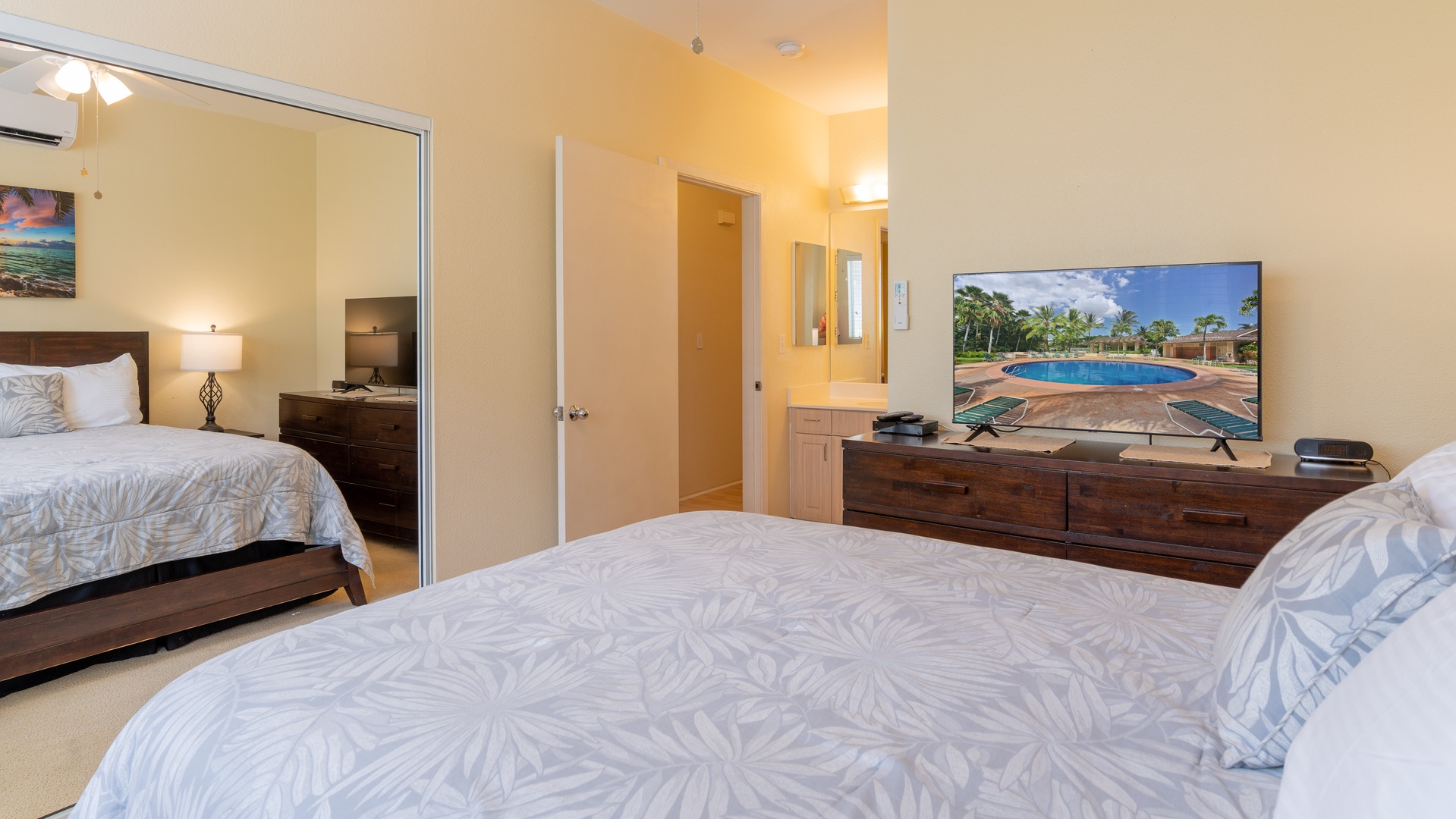 Kapolei Vacation Rentals, Fairways at Ko Olina 18C - The primary guest bedroom also provides a dresser for storage.