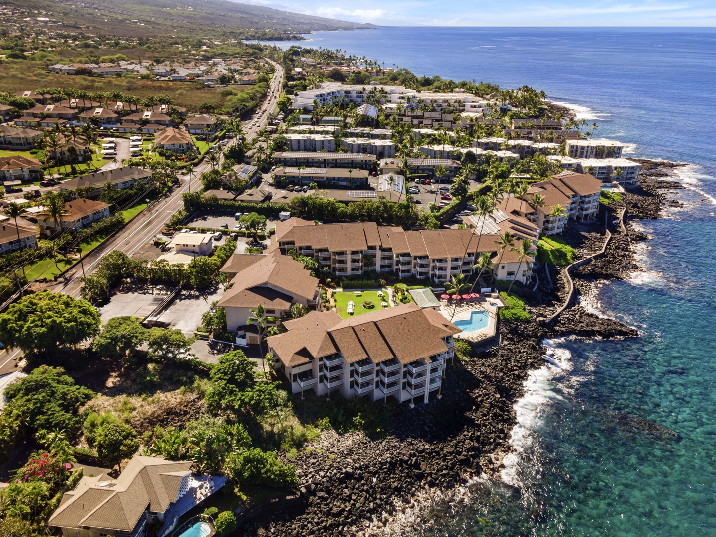 Kailua Kona Vacation Rentals, Sea Village 1105 - Aerial view reveals Sea Village’s prime coastline location and proximity to downtown Kona.
