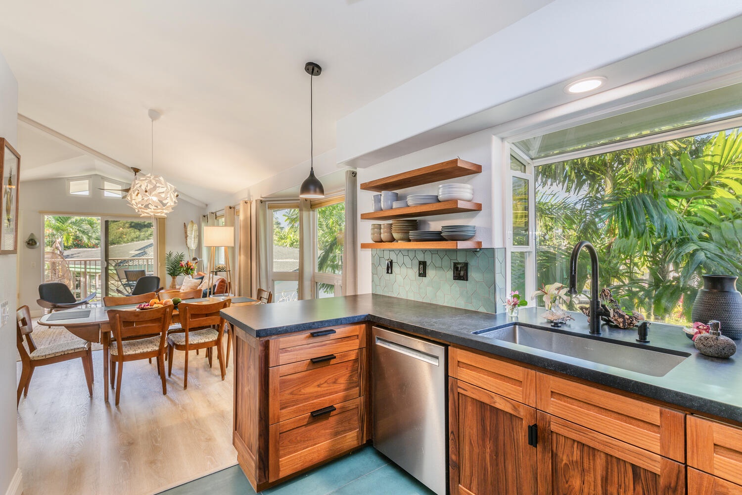 Princeville Vacation Rentals, Sea Glass - Seamless flow between the kitchen, dining and living areas, even stretching out to the lanai.