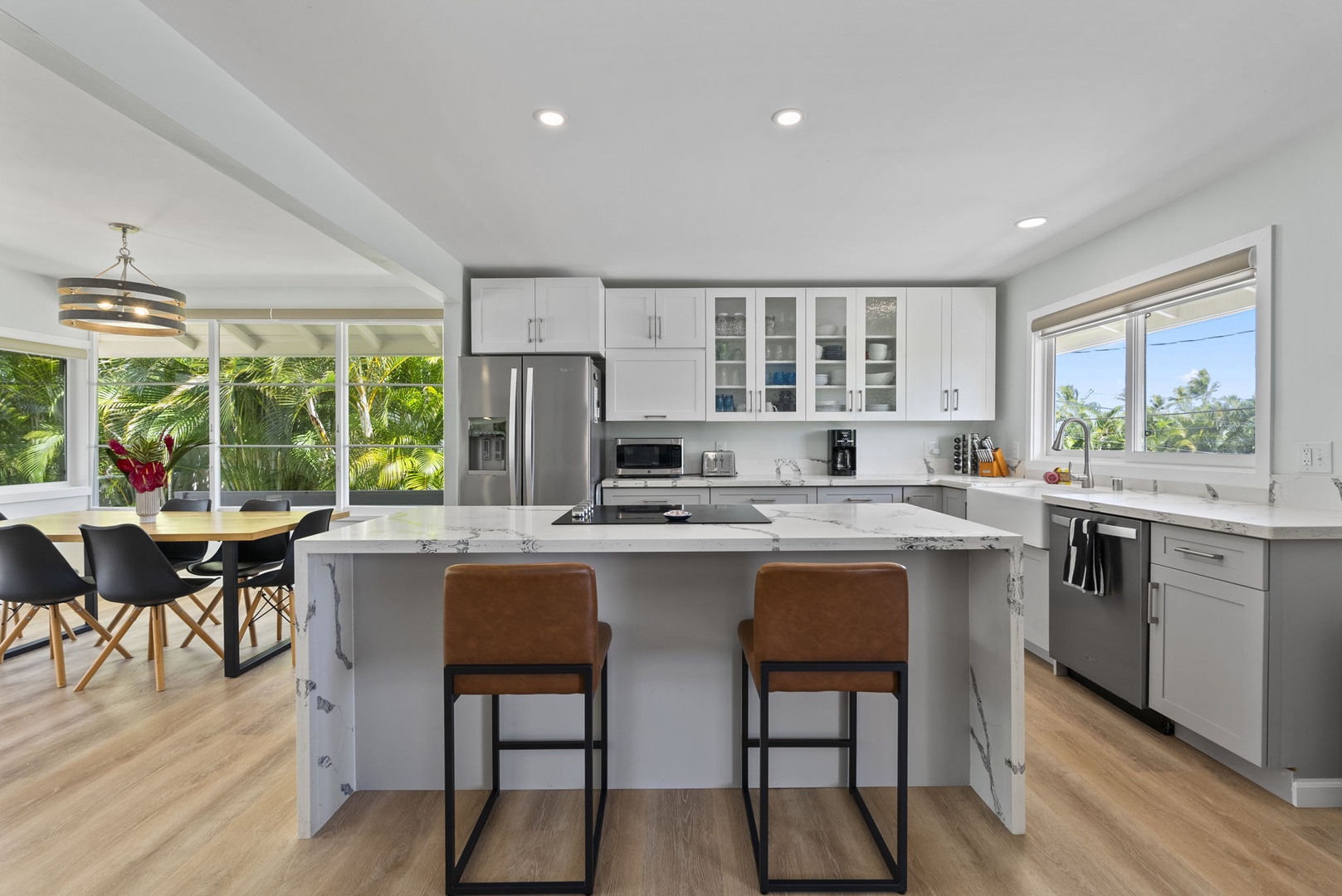 Kailua Vacation Rentals, Hale Alapi'i Lanikai Getaway - Craft your culinary delights in this sleek, fully outfitted kitchen, featuring a spacious island and stylish seating.