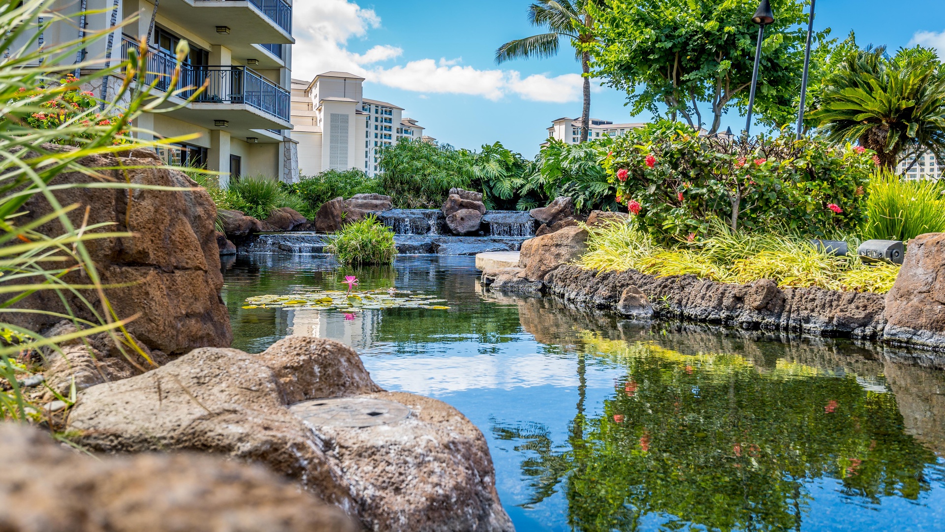 Kapolei Vacation Rentals, Ko Olina Beach Villas O704 - Lush tropical landscape and sparkling waters.