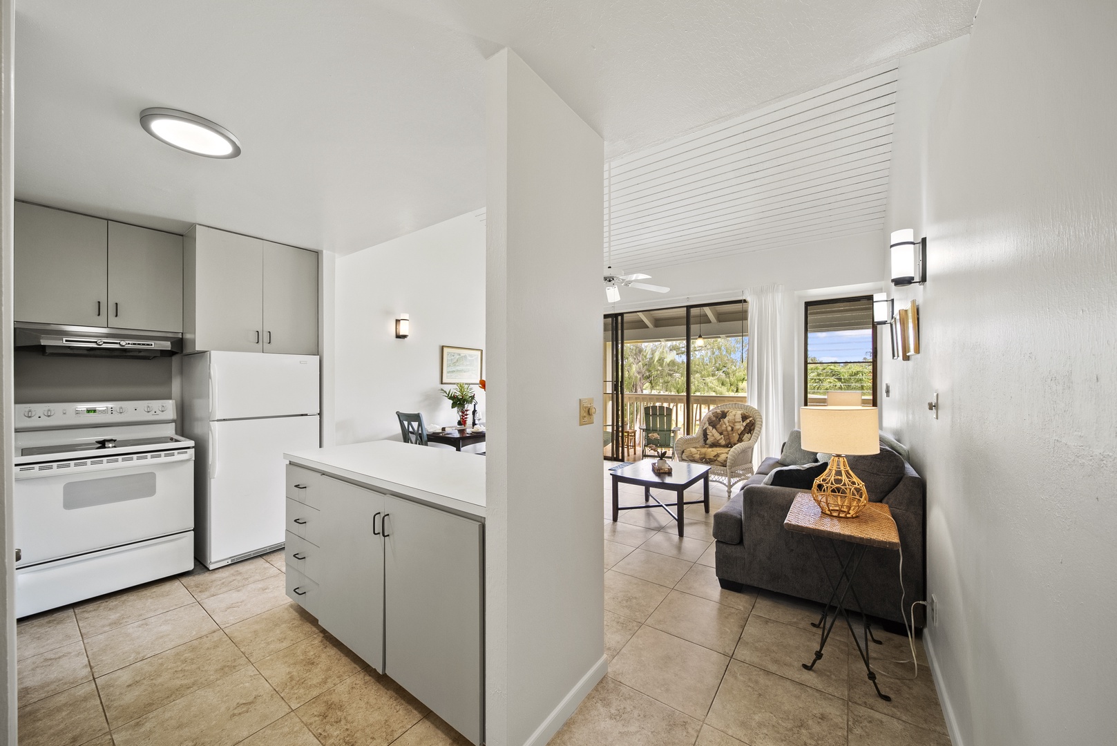 Kahuku Vacation Rentals, Kuilima Estates East #164 - View from the kitchen looking to the lanai and beyond.