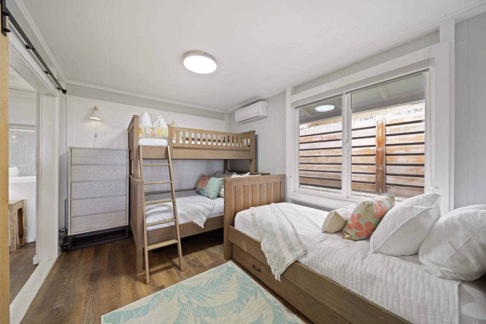 Haleiwa Vacation Rentals, Hale Nalu (Lower Level) - Guest bedroom #2 at the lower level, sleeps 4 people and is equipped with split A/C.