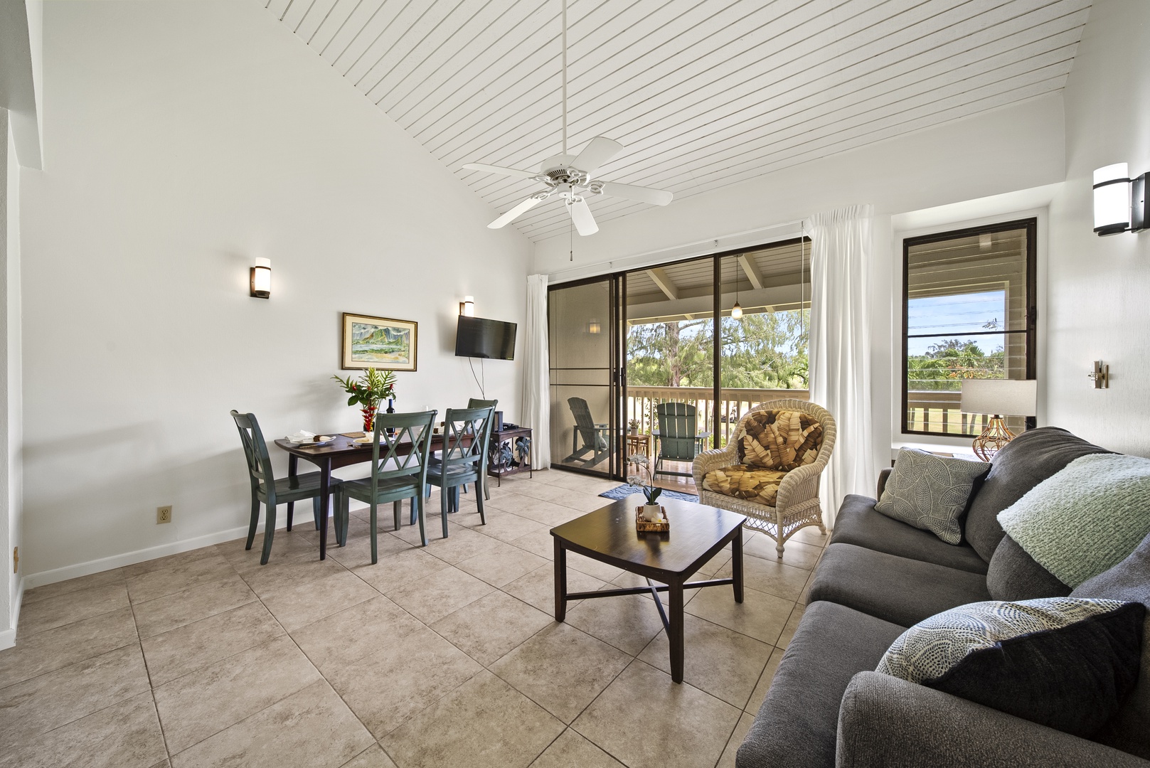 Kahuku Vacation Rentals, Kuilima Estates East #164 - Enjoy the fully equipped kitchen, dining area, flat-screen TV, queen-sized bed, and outdoor seating overlooking the golfers passing by.