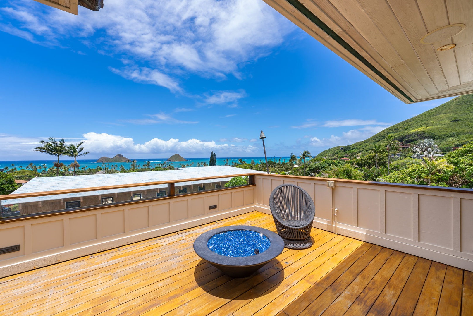 Kailua Vacation Rentals, Leaf House - Stunning panoramic ocean views stretch across vibrant turquoise waters from this private terrace, framed by lush green hillsides and tropical palms—your personal Hawaiian escape.