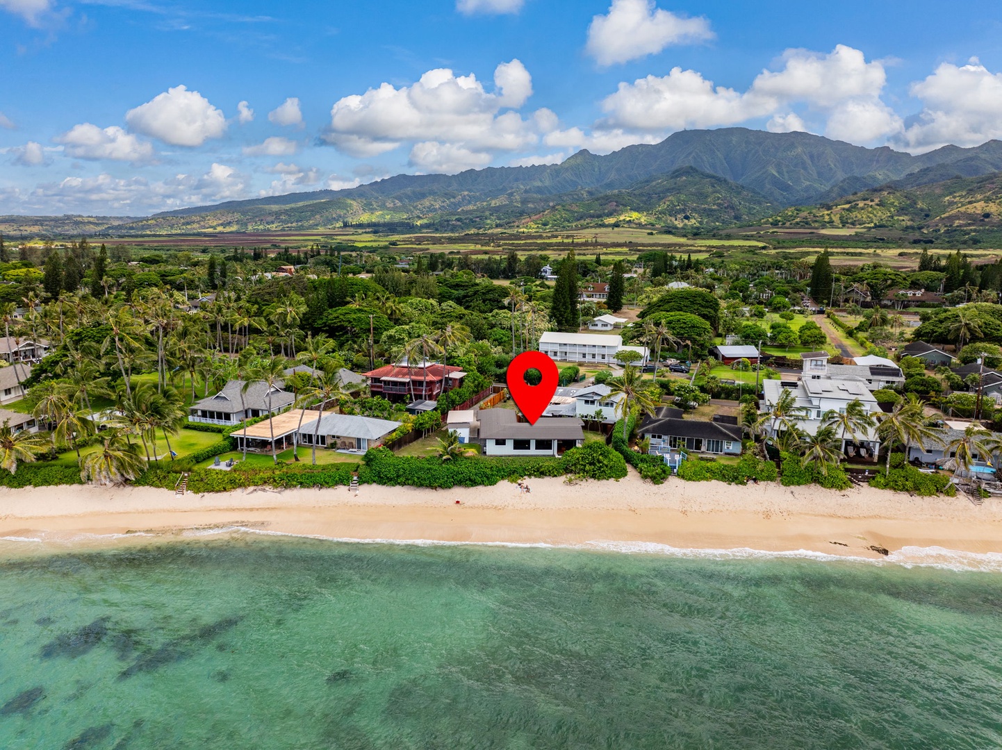 Waialua Vacation Rentals, Mokuleia Beach Villa** - Map pin of the location of your tropical home.