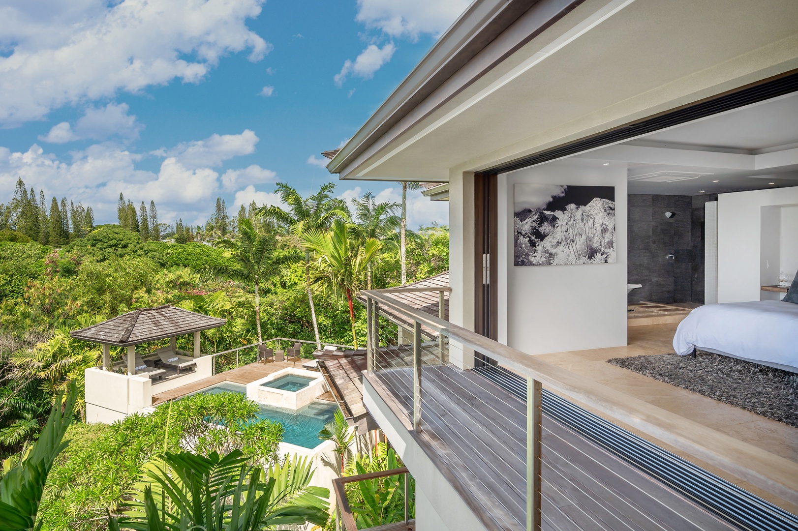 Princeville Vacation Rentals, Hanalei Plantation Villa - View of pool and master bedroom from second-level patio.