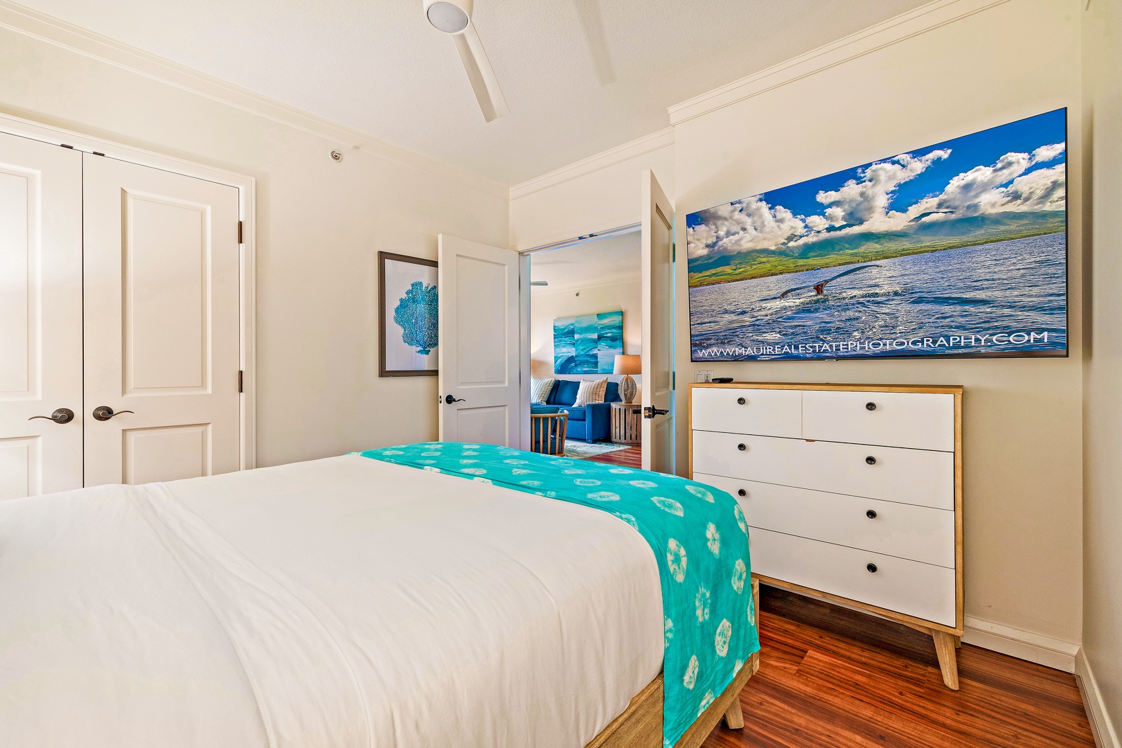 Lahaina Vacation Rentals, Honua Kai Konea 206 - This bright and airy bedroom features a flat-screen TV, a spacious dresser for storage, and easy access to the living area, offering both comfort and convenience.