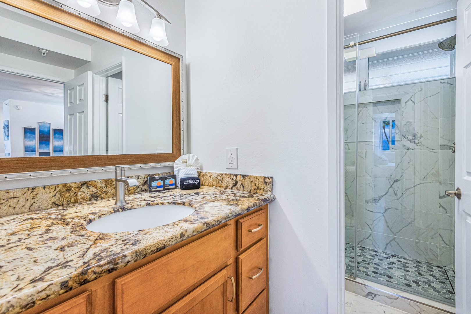 Lahaina Vacation Rentals, Royal Kahana 213 - The bathroom offers a spacious granite vanity and a walk-in shower, providing both style and convenience for your stay.