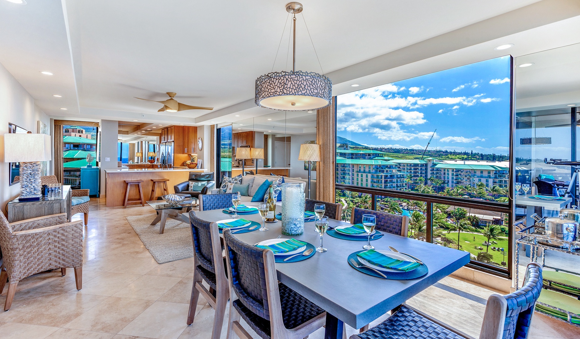 Lahaina Vacation Rentals, Mahana 1119 - Dining area with open-concept design and panoramic views of the ocean.