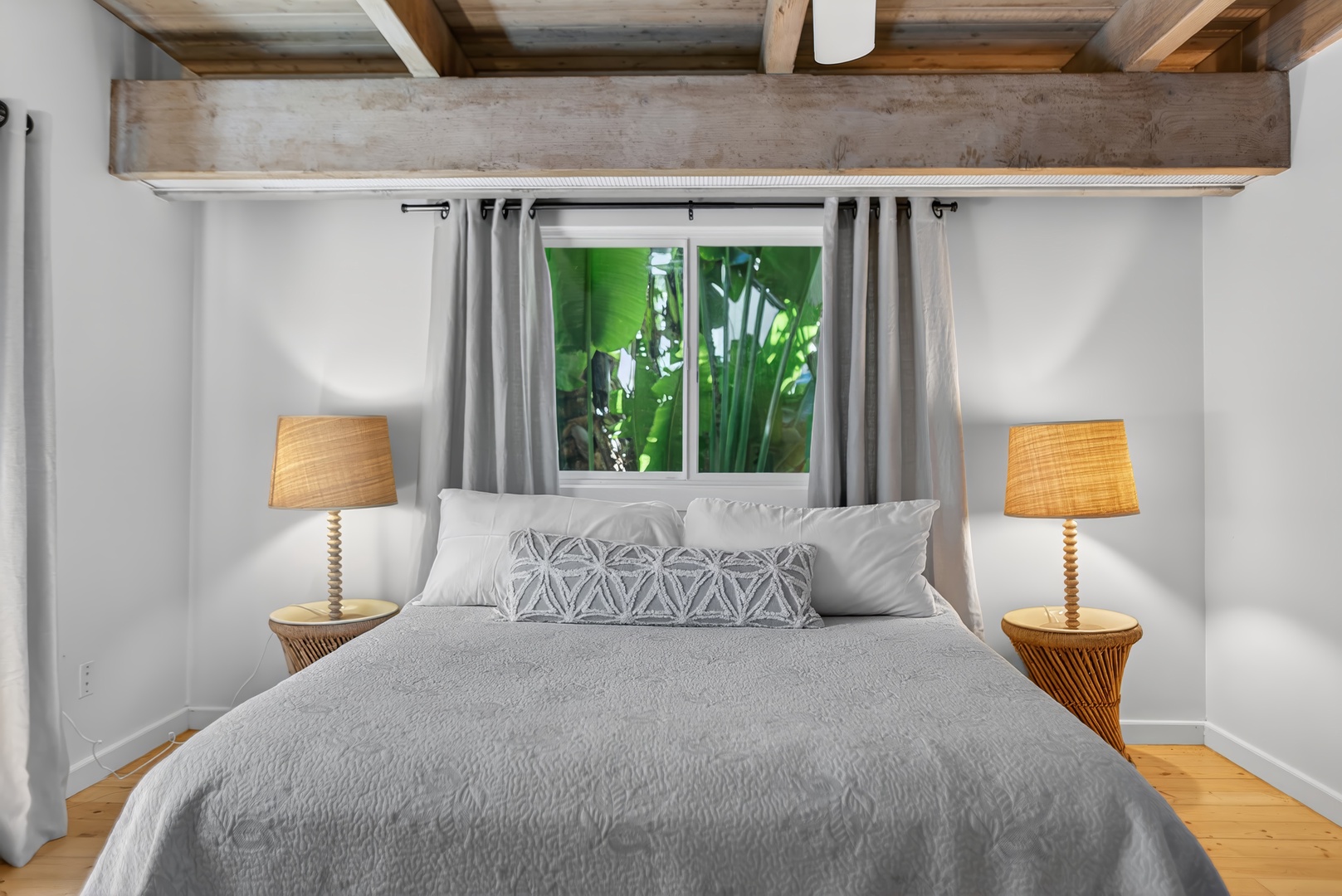 Haleiwa Vacation Rentals, Sunset Beach Hideaway - Soft lighting and warm wood details create a peaceful setting for restful nights.