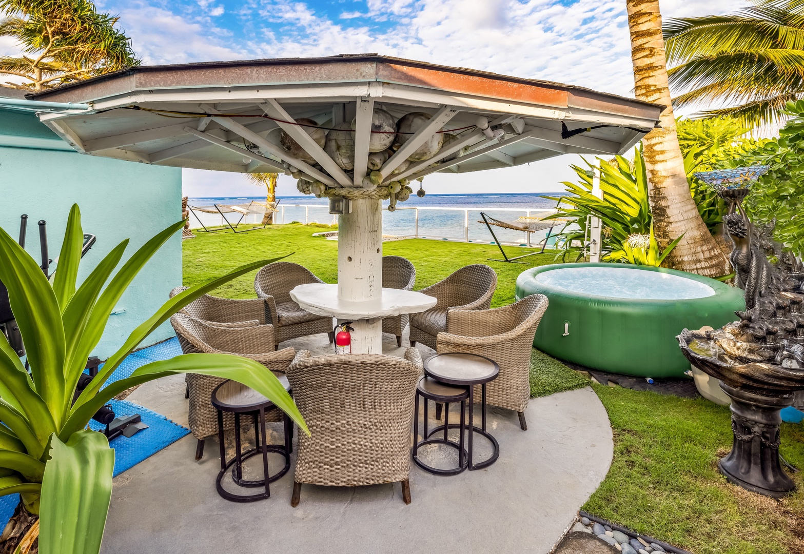 Hauula Vacation Rentals, Paradise Reef Retreat - Outdoor patio right beside the jacuzzi