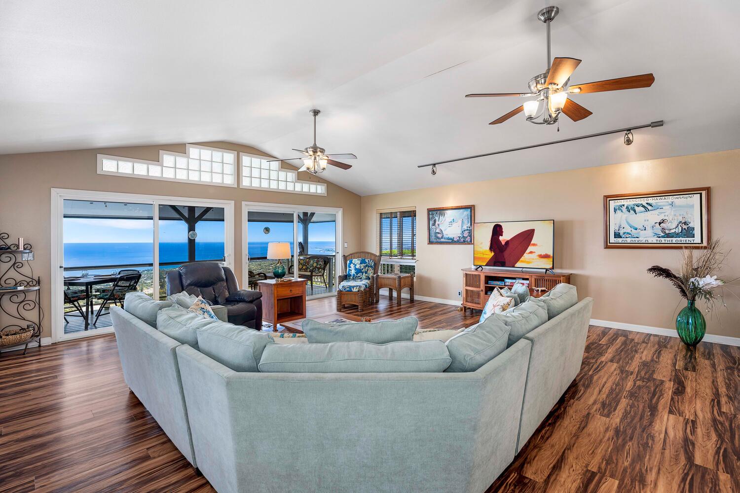 Kailua Kona Vacation Rentals, Honu O Kai (Turtle of the Sea) - Lounge in the living room with views towards the ocean.