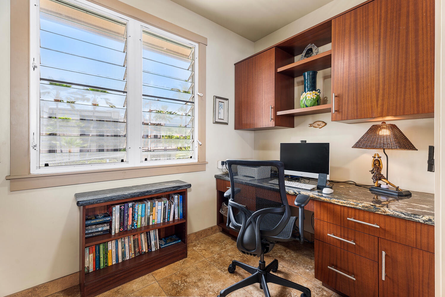 Kailua Kona Vacation Rentals, Kailani Vista - Built-in desk, pocket doors, computer, printer, high-speed Wi-Fi, A/C and garden views mean Zoom calls won’t cut into sunset mai tai time.