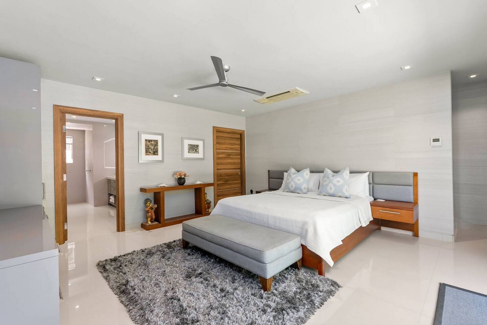 Honolulu Vacation Rentals, Diamond Head Beachfront Estate 9BR - Warm wood tones keep this estate bedroom feeling grounded and calm.
