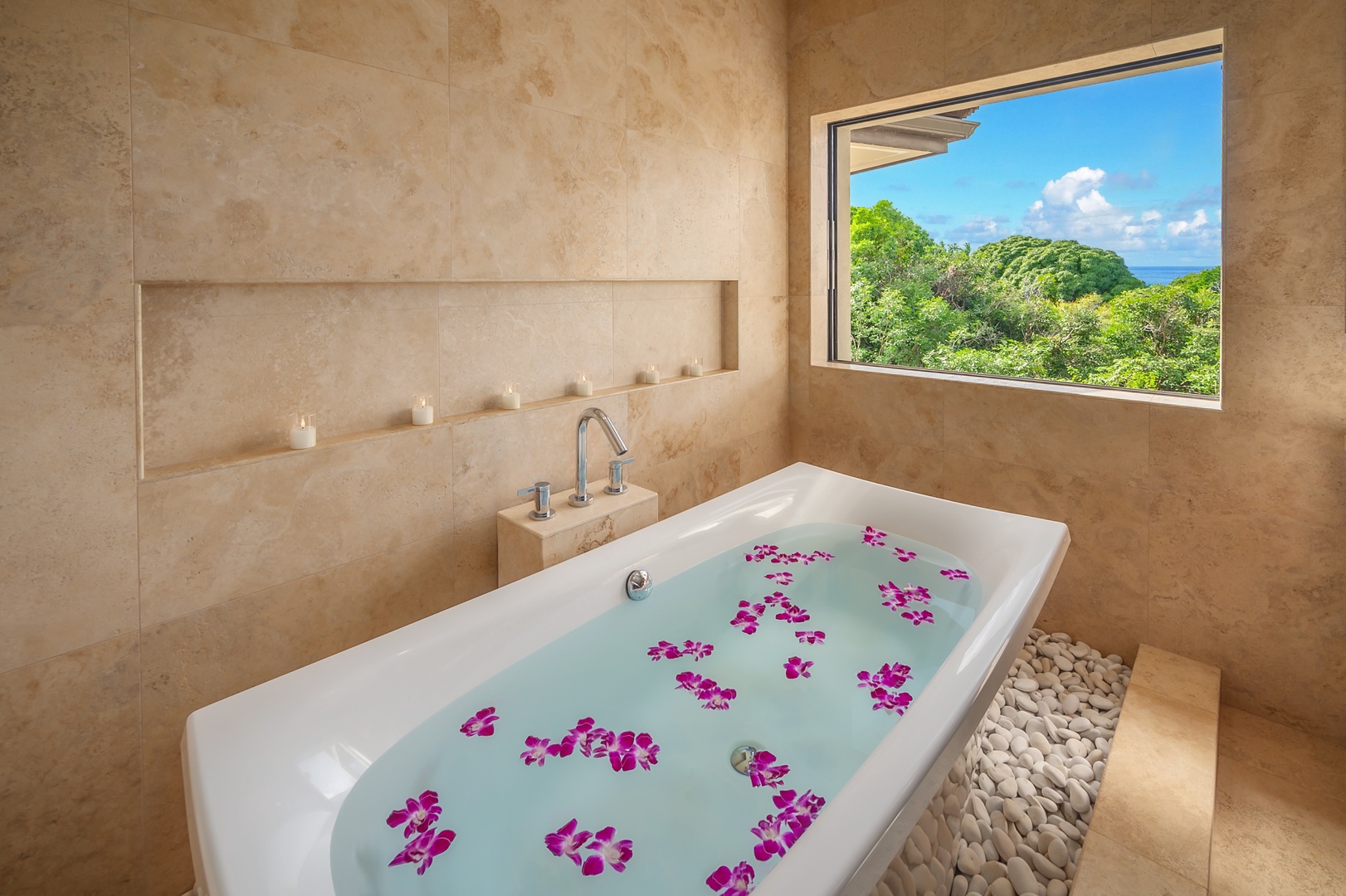 Princeville Vacation Rentals, Hanalei Plantation Villa - Luxurious soaking tub adorned with flower petals, offering a perfect setting for relaxation with a view.