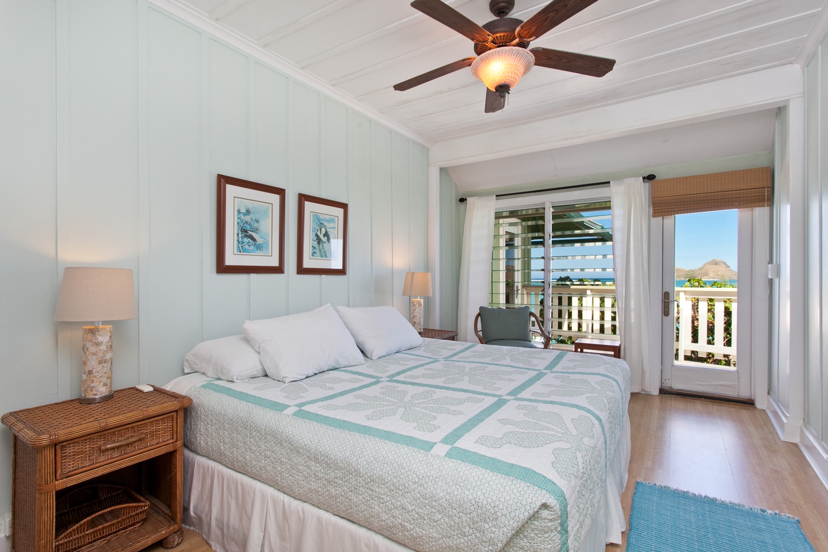 Kailua Vacation Rentals, Lanikai Village* - Hale Kainalu: Guest bedroom features a king bed and access to the lanai.
