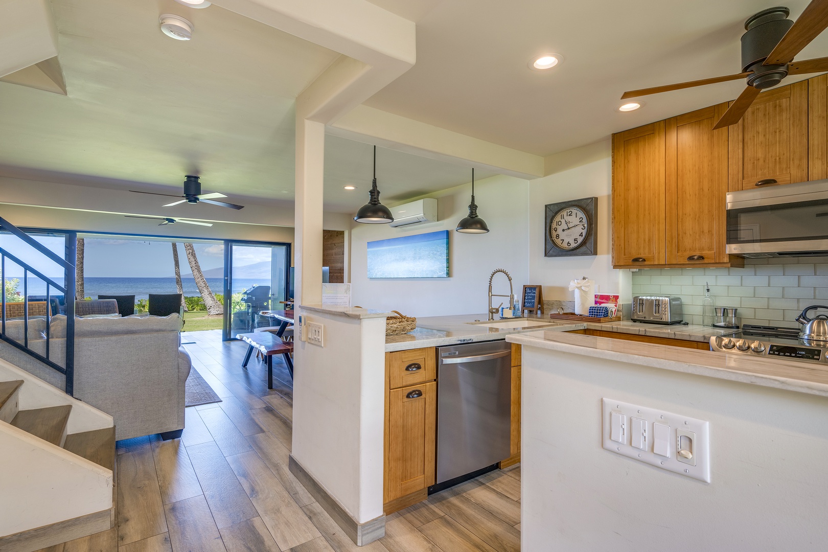Lahaina Vacation Rentals, Puamana 240-3 - Sleek countertops and ample prep space in a beautifully updated kitchen, ideal for your culinary creations.