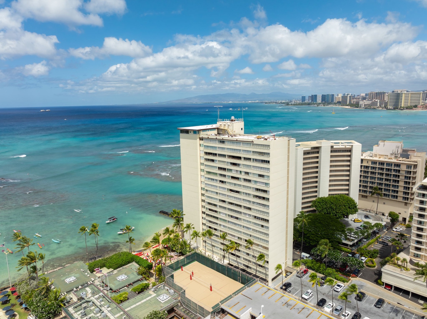 Honolulu Vacation Rentals, Colony Surf Luxe - Colony Surf stands proudly above the shoreline, delivering unrivaled views and private beachfront access for guests.