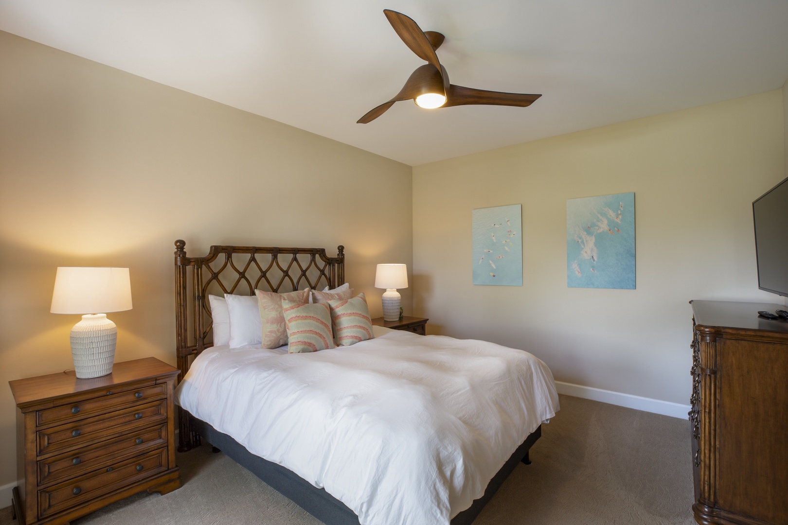 Kamuela Vacation Rentals, Mauna Lani KaMilo #503 - This welcoming guest room offers a plush queen bed and gentle lighting—your quiet corner for rest and rejuvenation.